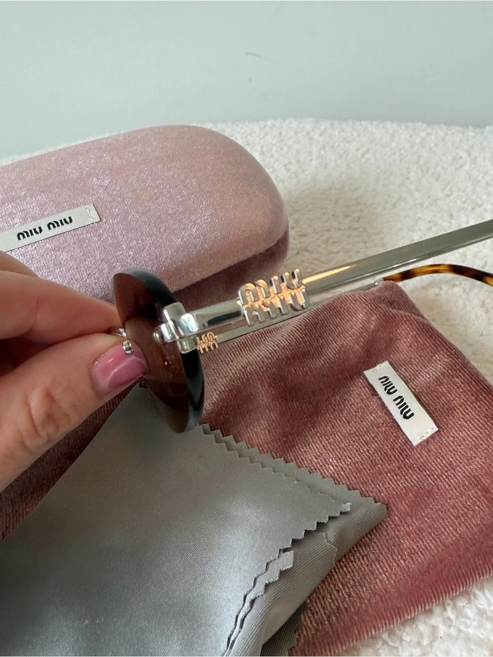 MIU MIU oval brown and silver sunglasses